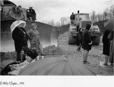 Protesters stand in front of bulldozers to stop strip mining near Cordia School in 1972. The protest was part of the early anti-strip-mine movement. Fighting for the community is nothing new for the school, says Alice Whitaker. (Photo by Robert Cooper, 1972)