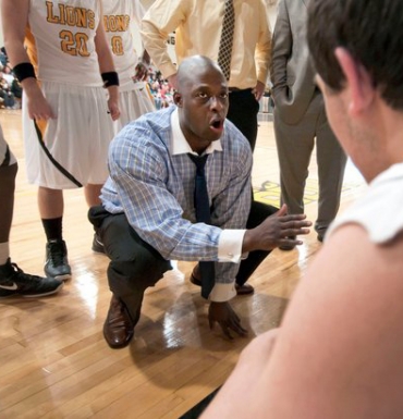 Rhodes and his team during a 2011 home-court loss to Knott Central (Photo by John Flavell)