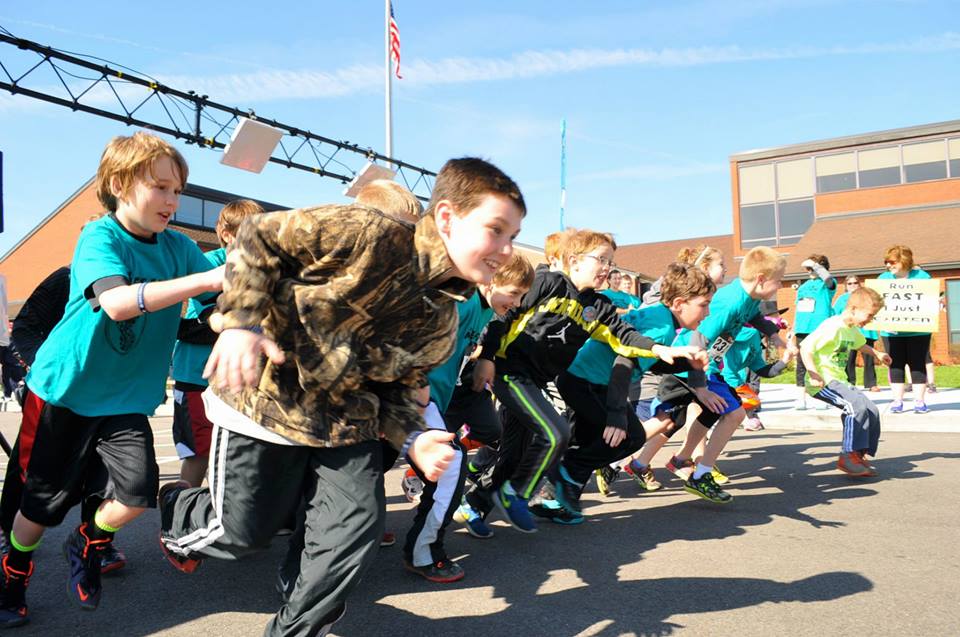 Taking off from the Kids Race at Morgan Elementary School during the 2015 Miles for Matthew 5K, which this year includes a Virtual Race.
