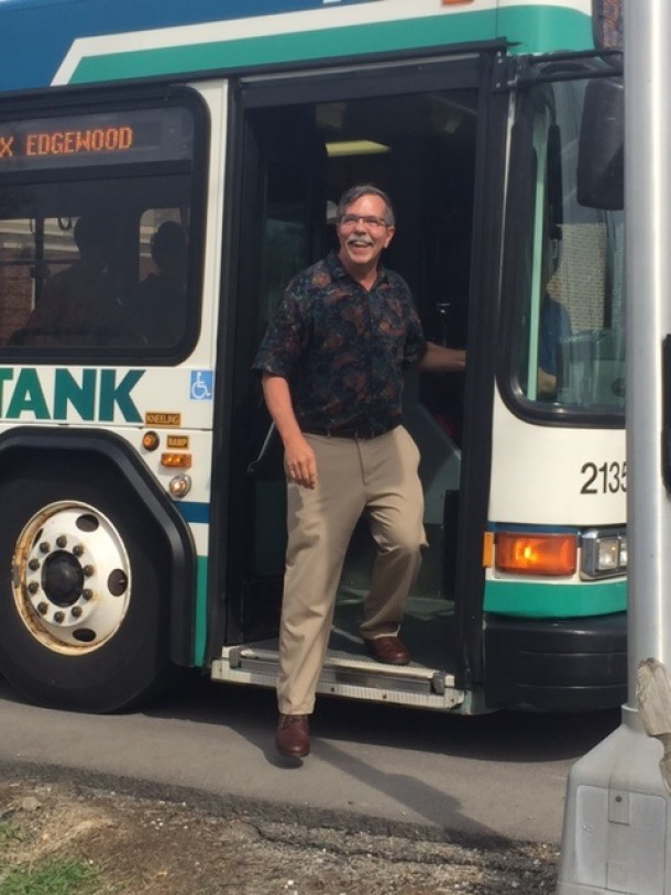 After 35 years of riding TANK to work, John Rouster is retiring — so surprise curbside party was in order