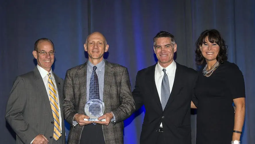 Dan Tobergte, president & CEO, Northern Kentucky Tri-County Economic Development Corporation; Mike Hirsch, COO and vice president of operations, Robert Bosch Automotive Steering, LLC; Jeff Wuenker; and Johnna Reeder, president & CEO, REDI Cincinnati celebrate Bosch's Growth Award.