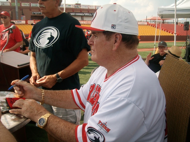 Rose signs autographs at a Florence Freedom game last season. (Photo by Mark Hansel)