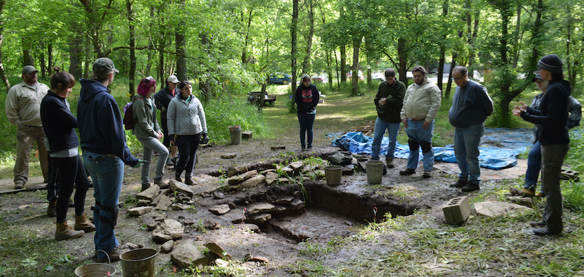 Student and faculty at the site.  (Photo by Eric Goetz)