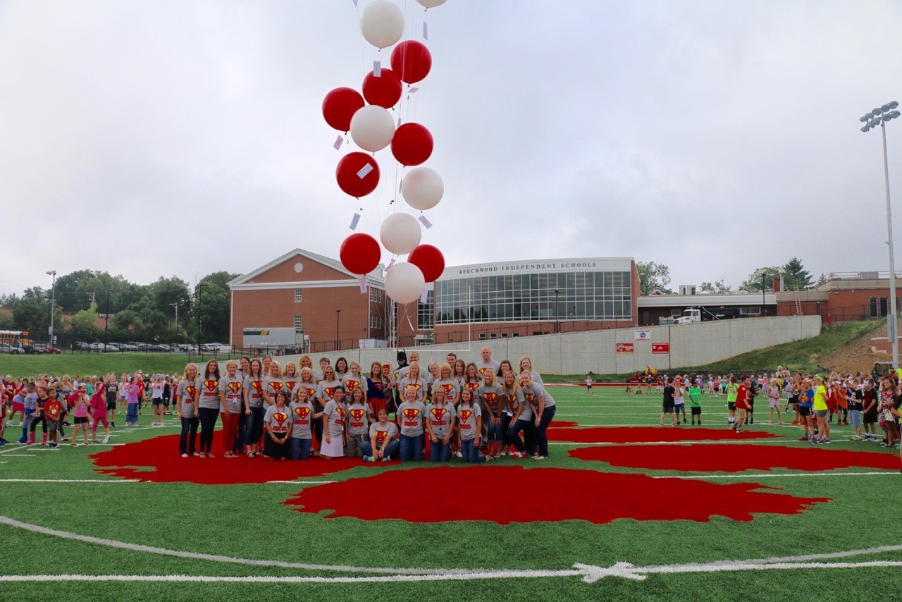 Beechwood Elementary 'super heroes' gather on the school's football field to let their goals for the school year soar.