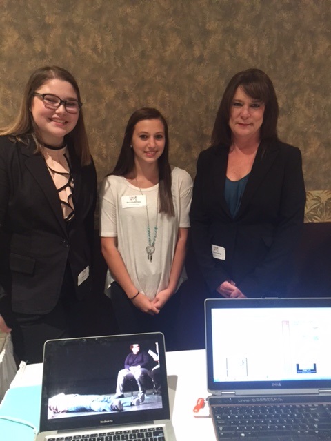 Connor High School students, Lindsey Ford, a sophomore, and Brenna Williams, a junior, and media instructor Donna Redding.