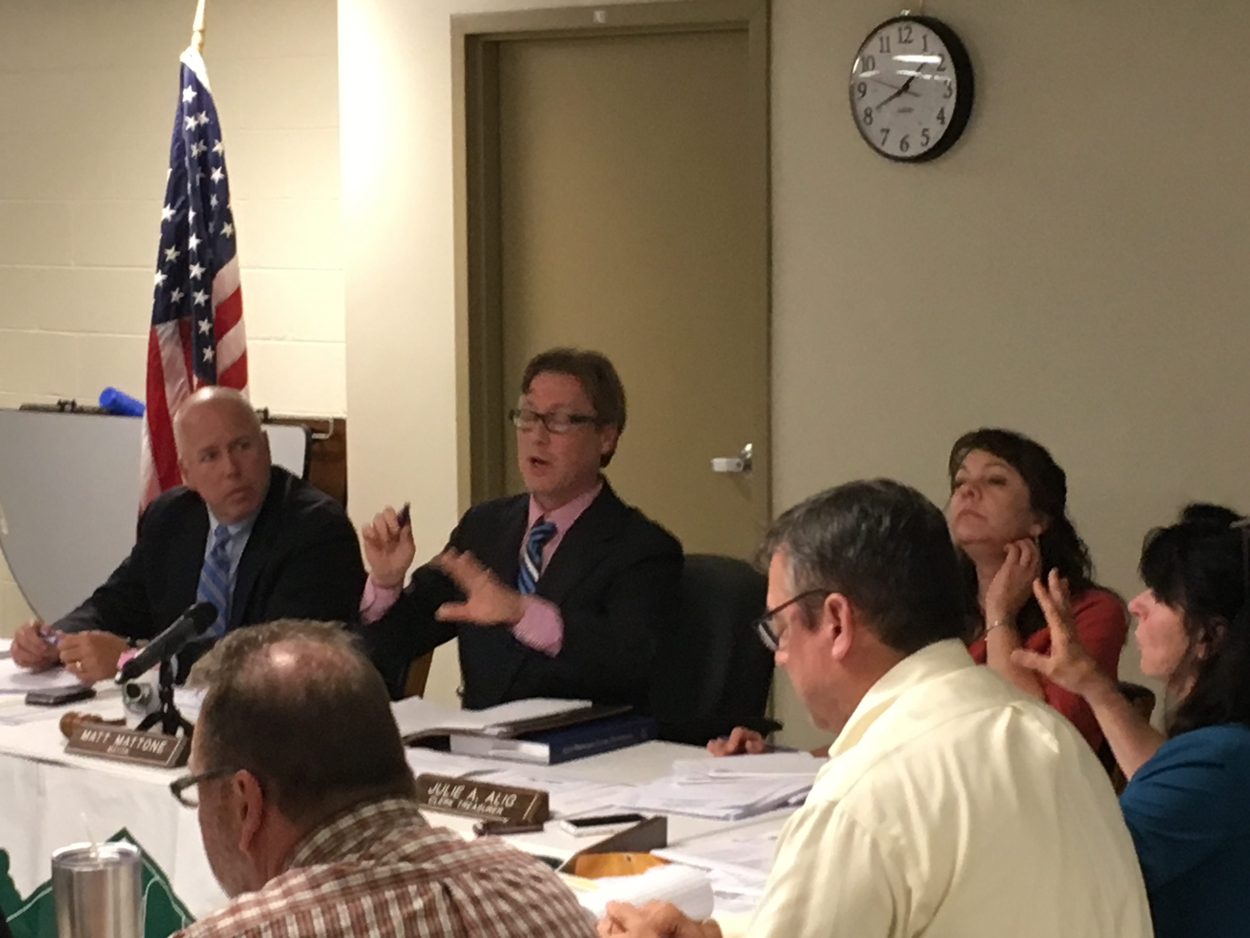 Park Hills Mayor Matt Mattone discusses the proposed residential development at Monday's council meeting. City Attorney Todd McMurtry is at left.