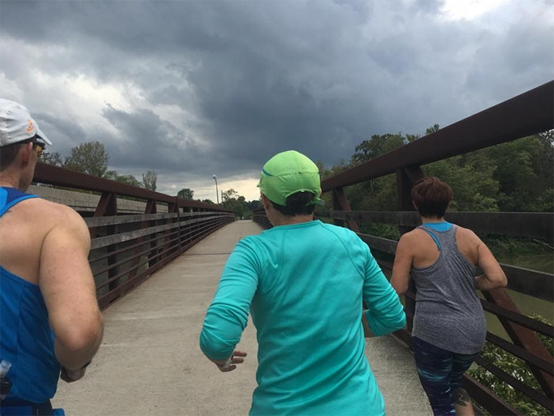 Jim White and fellow runners start his 78.6-mile run as a storm approaches. (Photo by Emily Horseman) 