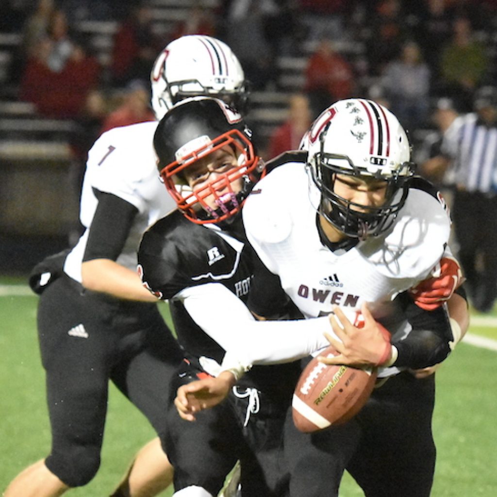 Holy Cross football team wins big in opening round of Class 2A playoffs