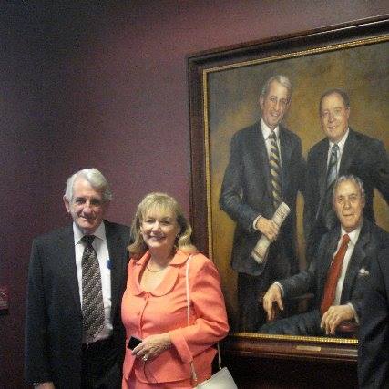 Biz and Jackie with the official portrait of The Bank of Kentucky founders.