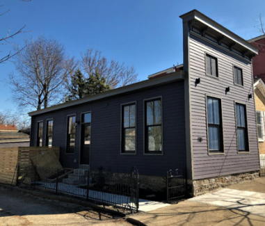 From eyesore to definitely NOT eyesore: Tom Covert bought sad house from Covington, made it a home