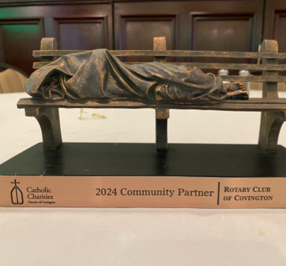 Rotary Club of Covington receives Catholic Charities’ bronze ‘homeless Jesus’ Community Partner Award